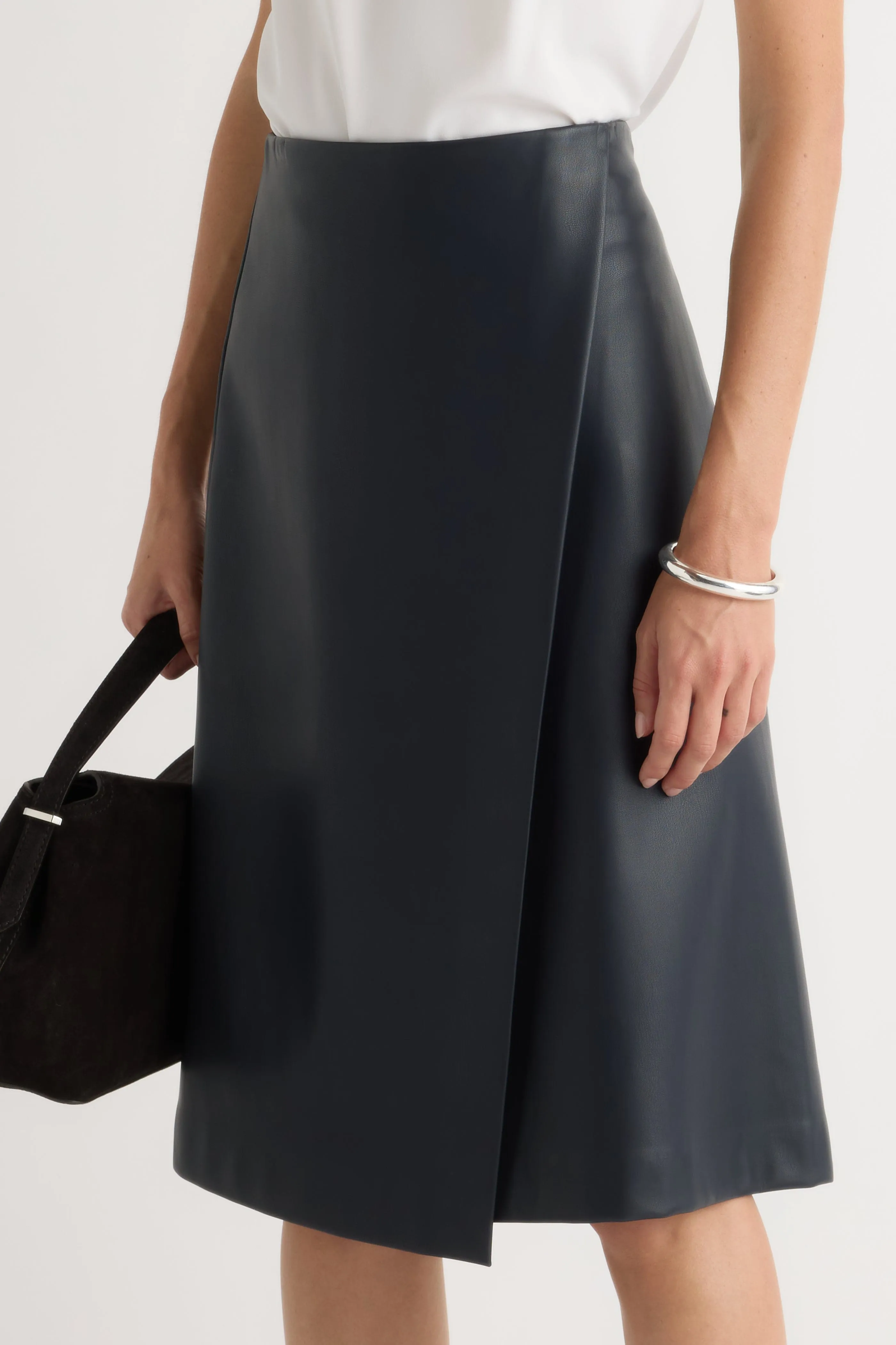 Alba Asymmetric Vegan Leather Skirt Laser Cut Edges