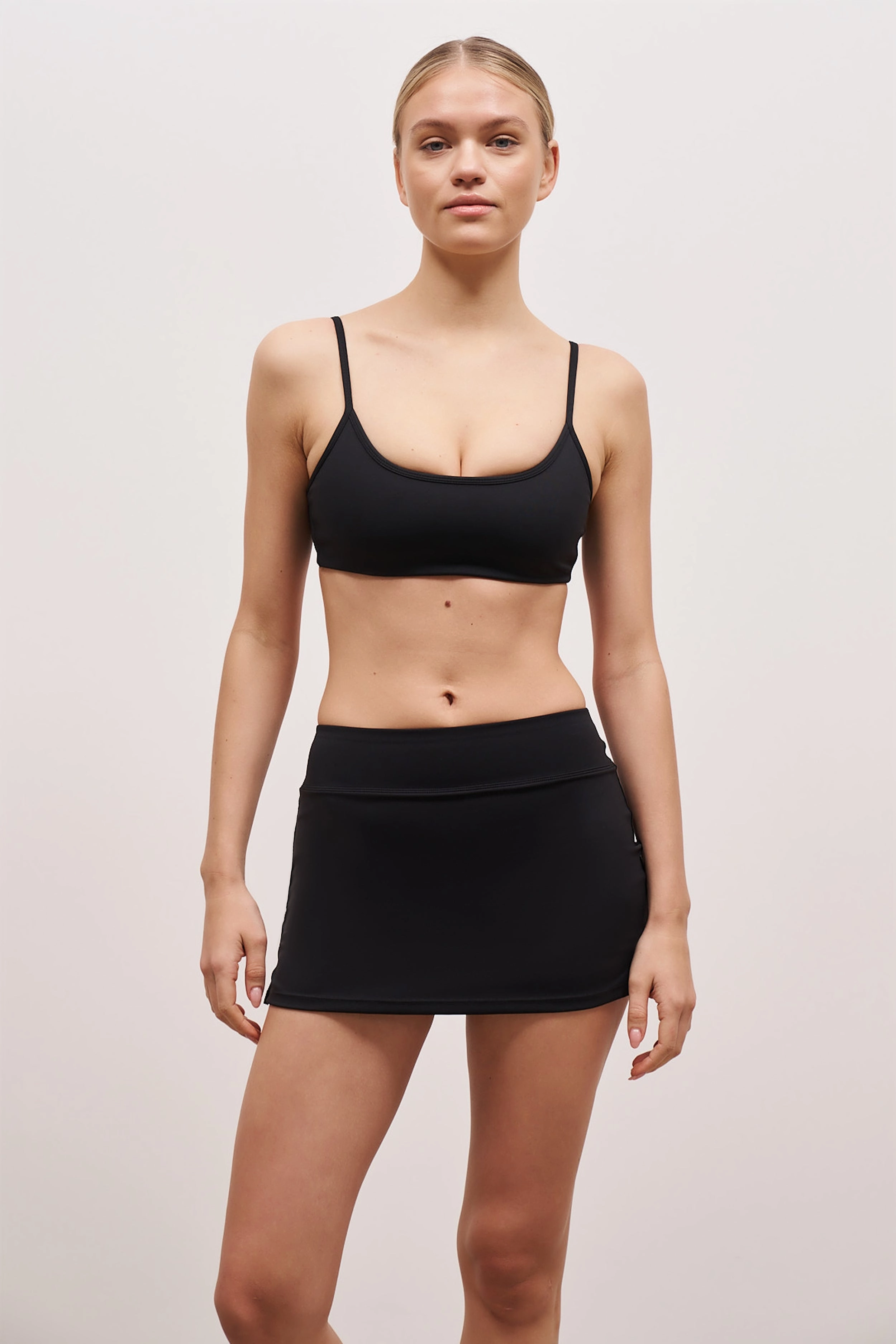 Base Sculpting Tennis Skort - Black Lightweight Material NonRestrictiveSilhouette