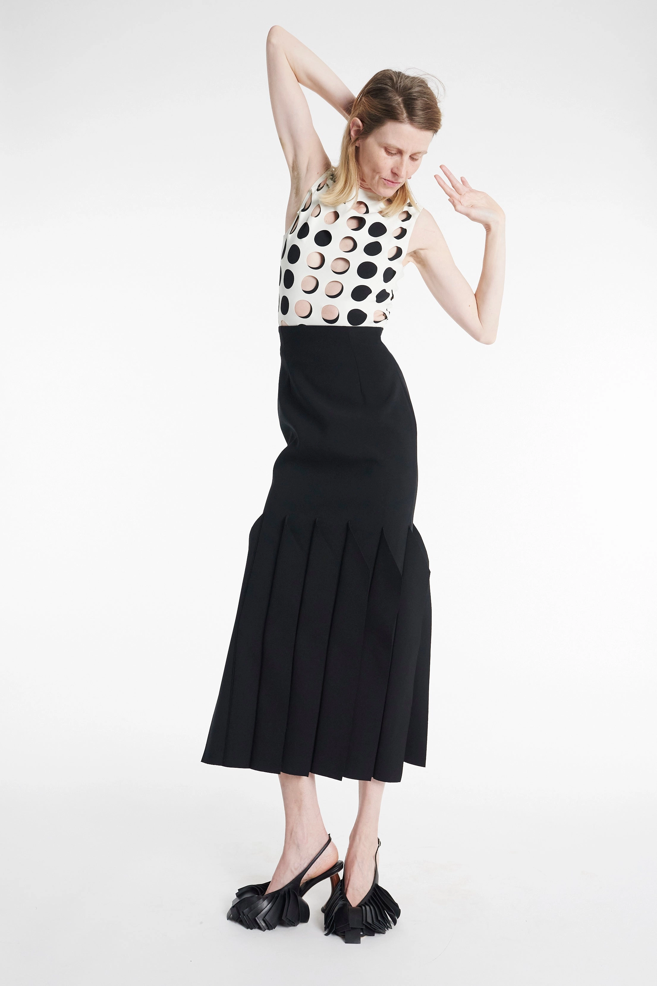 Flexible Shoulder Gusset Shape Retention Fabric Top With Layered Circular Cutouts White Black