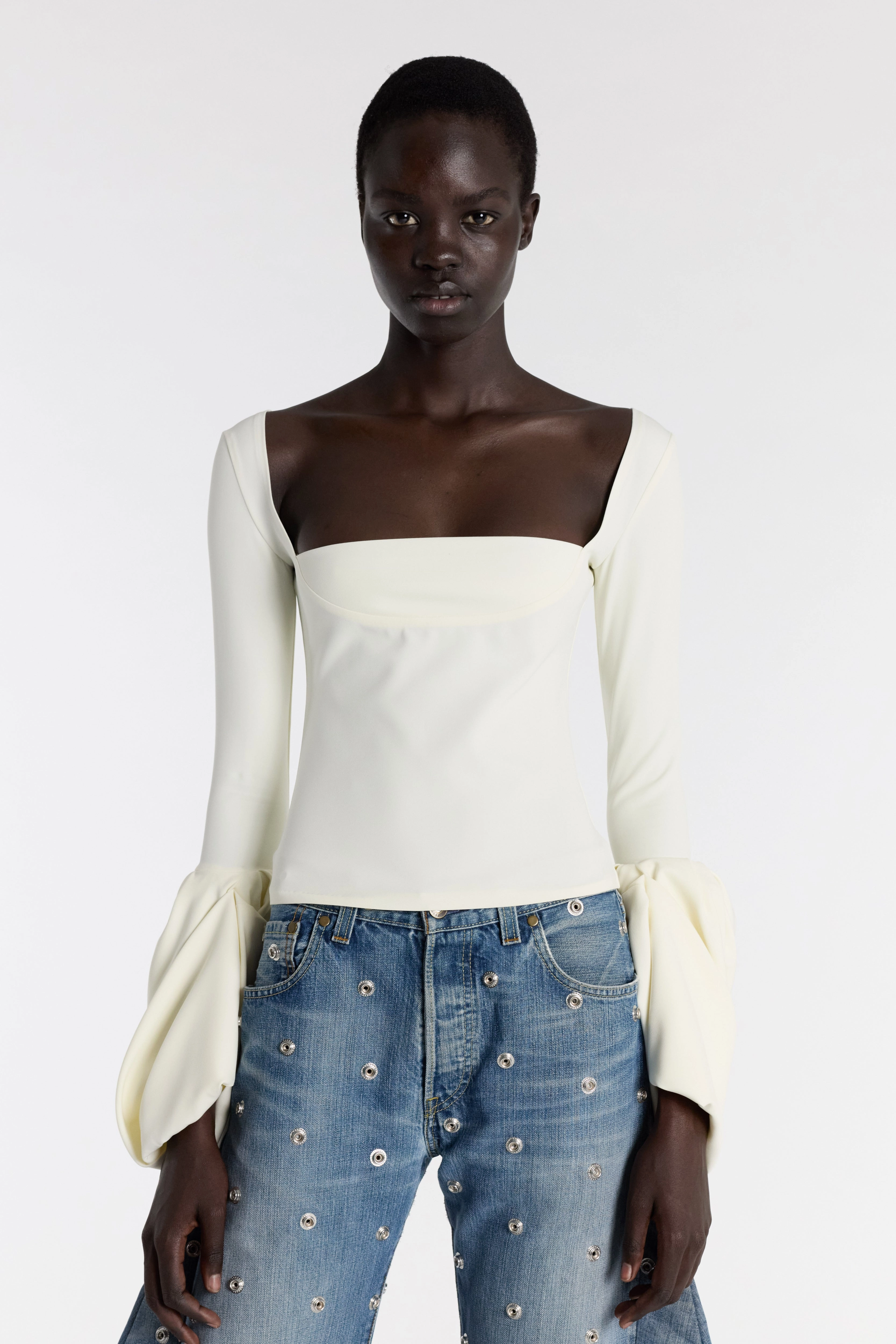 MultiPocket Configuration Thermal Regulating Fabric Top With Square Decollete And Puff Cuffs Ivory