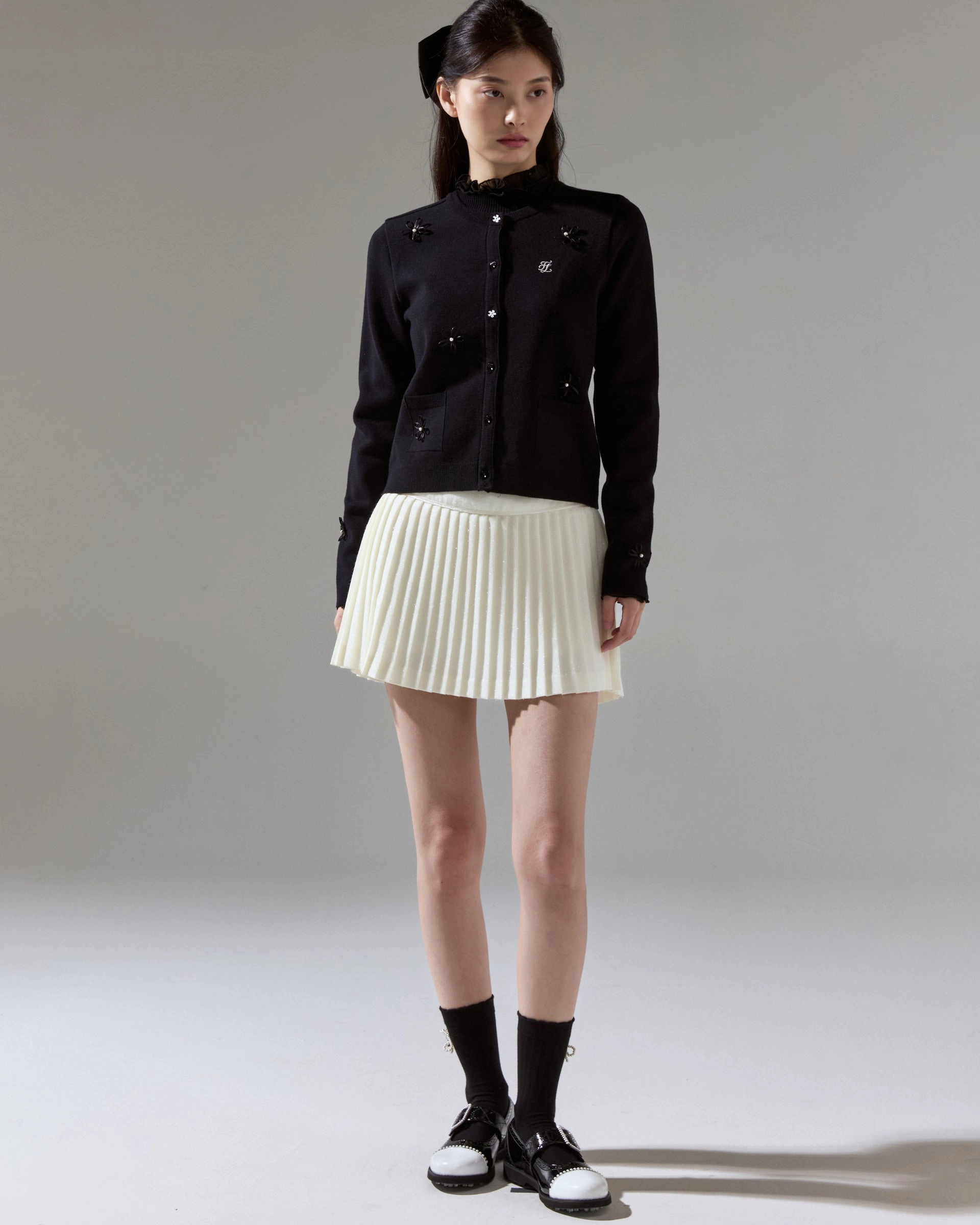 Tapered Side Panels Quick Dry Feature Leather flower trimmed cardigan - Black