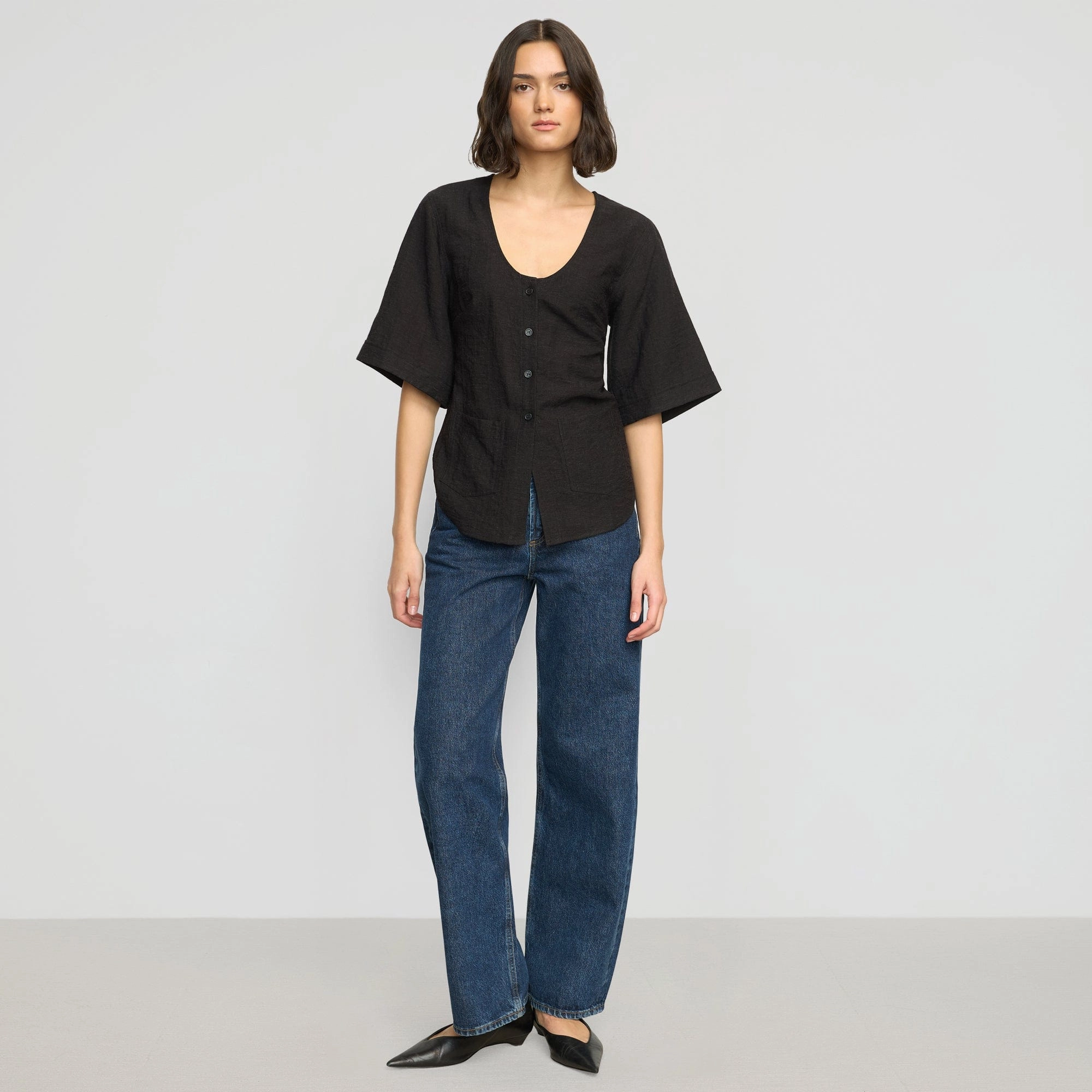 Katniss Pocket Tulip-Hem Blouse Minimalist Collar